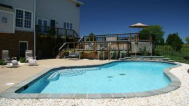 Swimming in the Sun in a Vinyl Pool Installed by Companies in Senoia